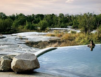 Girl in pool at Londolozi, Solo travellers in Africa